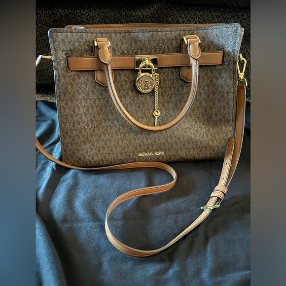 Michael Kors brown monogram bag. - Picture 1 of 3